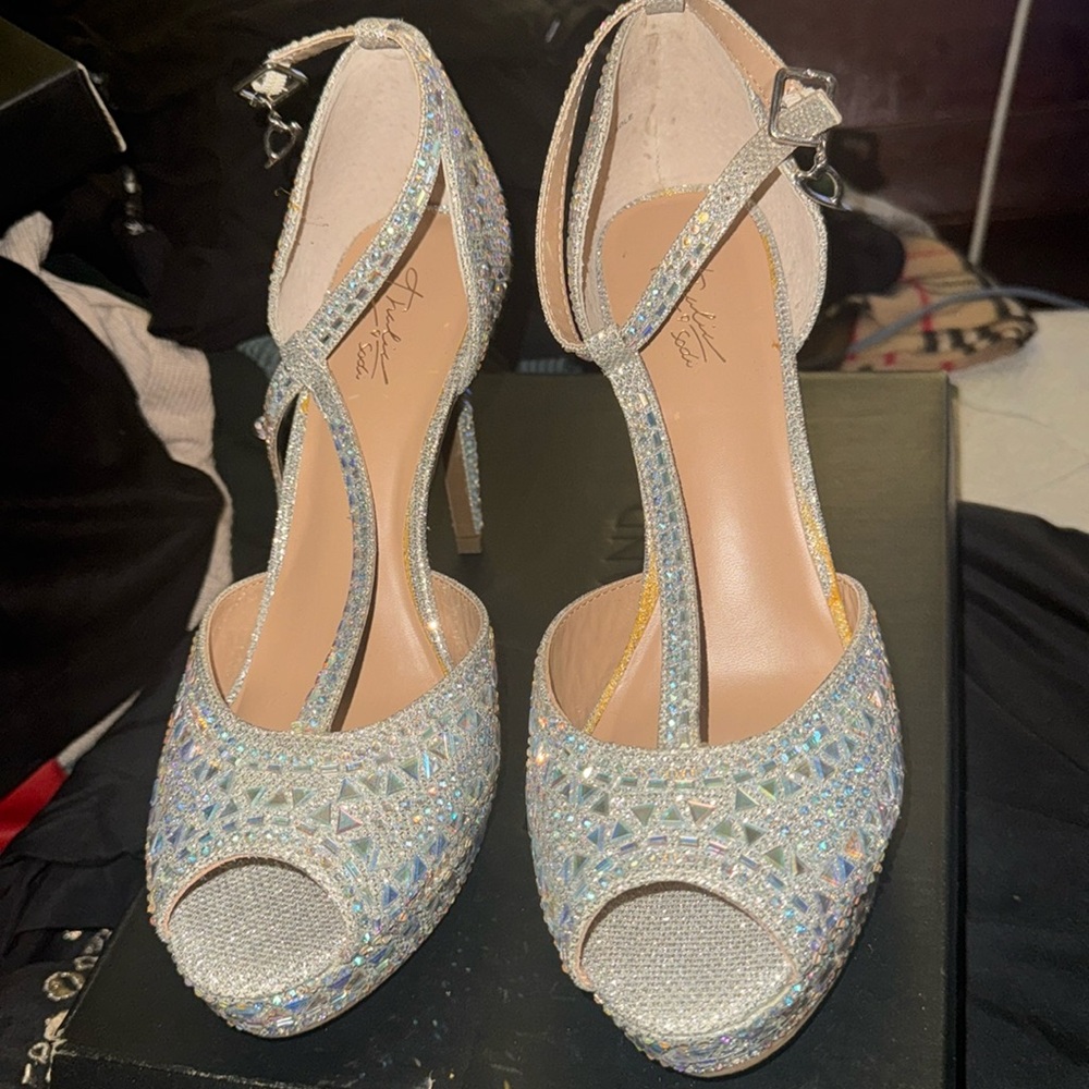 Size 9 1/2 platform heels. Never worn